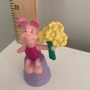 Disney Piglet Holding A Bouquet Of Flowers While Sitting On A Flower Pot Figure